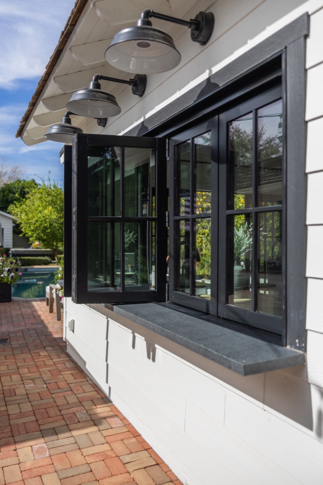 Black steel windows on a white pool house, Arcadia